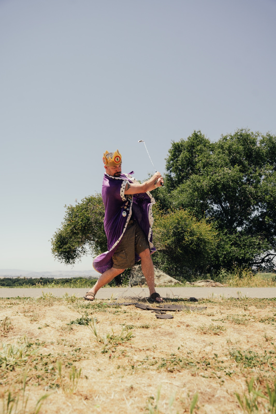 Dynamic golf swing action shot with follow-through motion