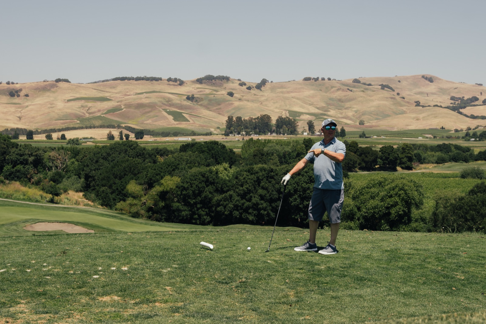 A golfer sizes up the Napa hills at the Tee Off Fore Kids tournament
